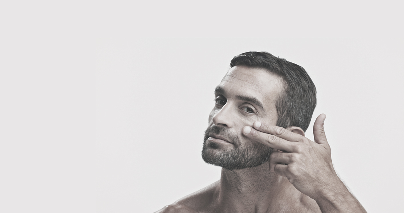 A Man Taking Care Of His Skin